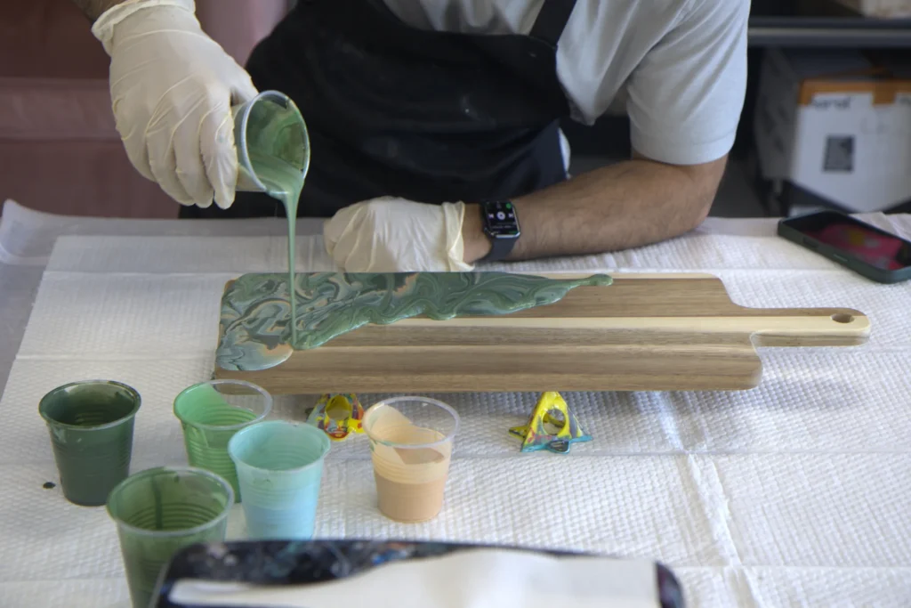pouring-green-resin-charcuterie-board-naperville-wide